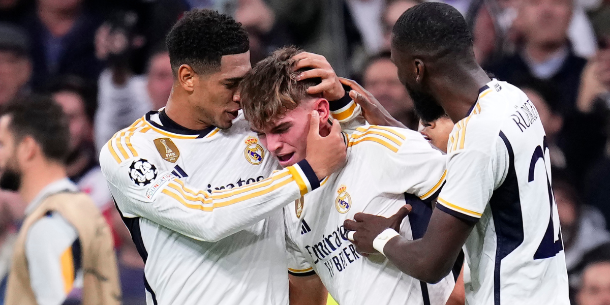Real Madrid comfortably beat Napoli 4–2 on Wednesday to secure the top spot in their Champions League group, with Jude Bellingham impressing again.